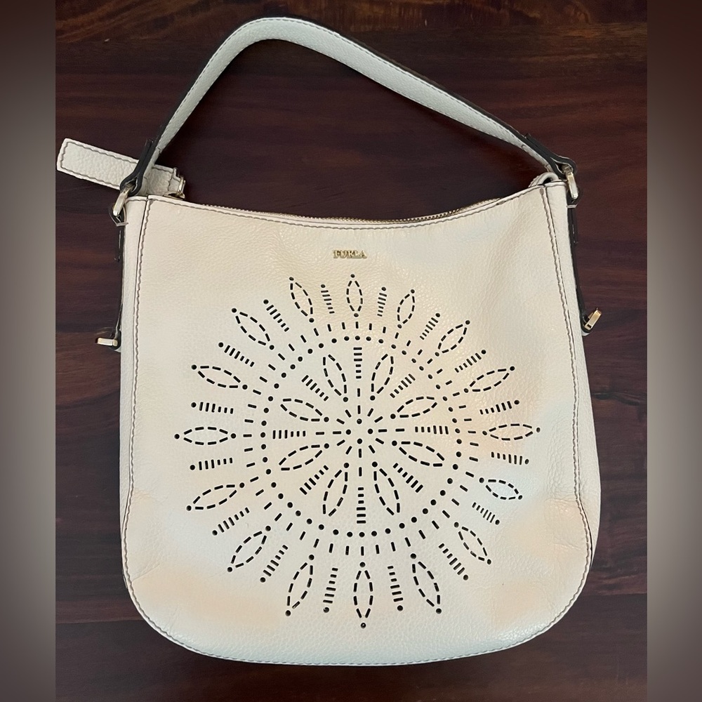 Never used cream Furla bag with cutouts